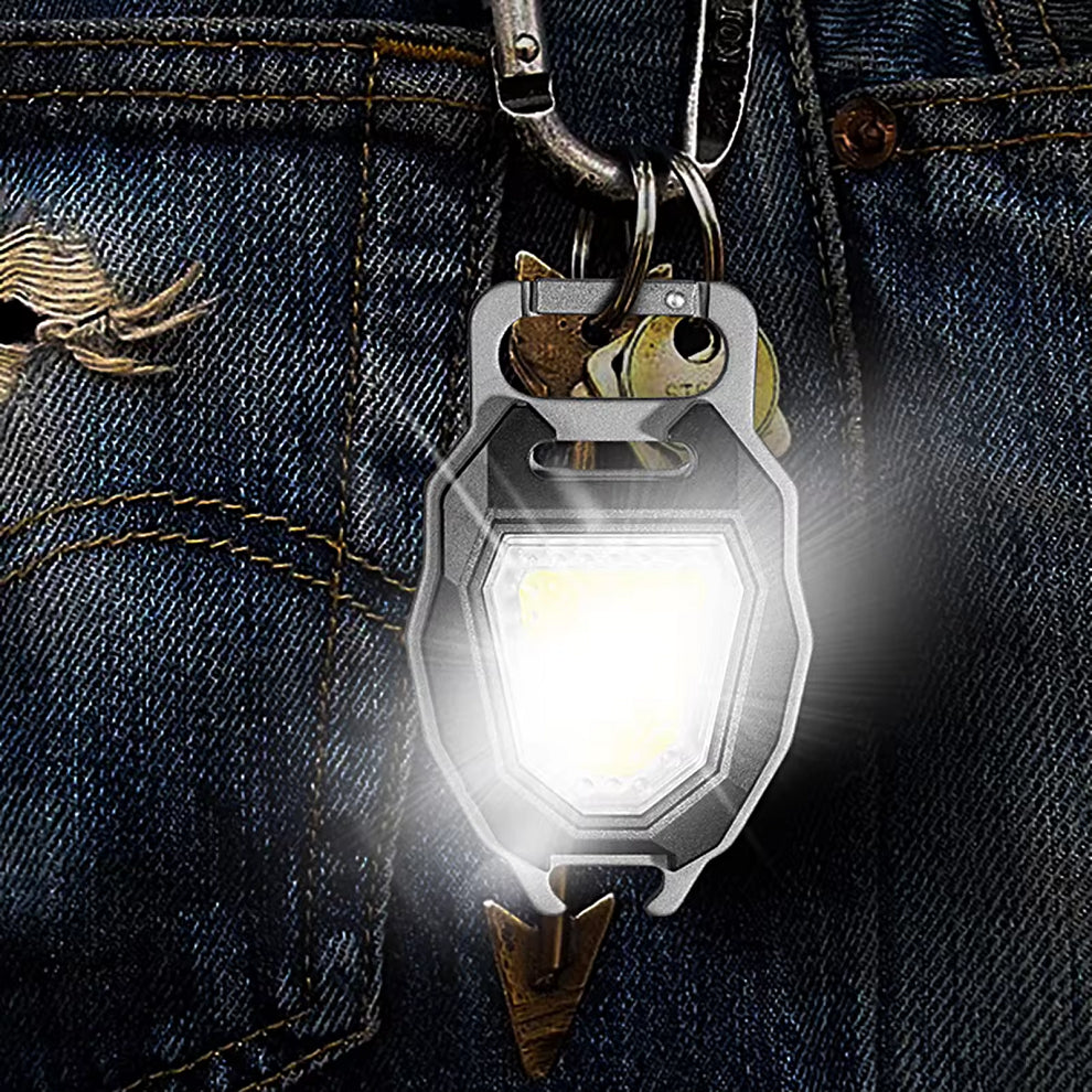 Multi Purpose 4-in-1 Keychain: Light, Lighter, Bottle Opener, and Whistle"